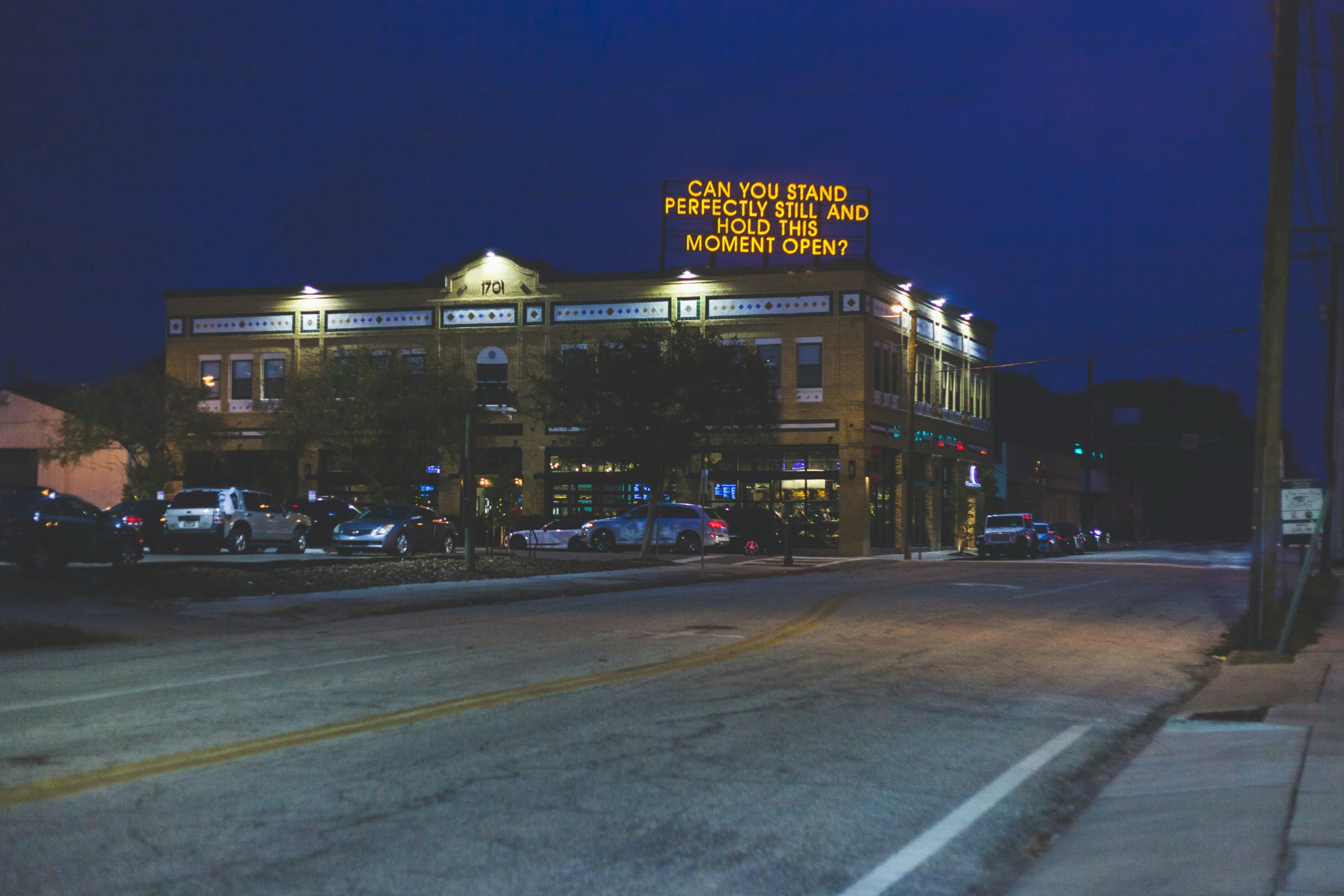 an empty street is next to an empty business