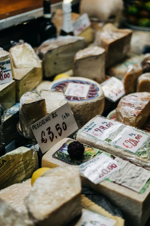 a display case at a store that sells cheese