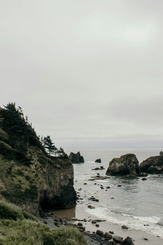 there is a light house that is near the water