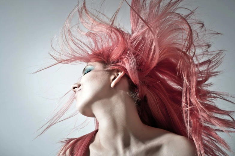 an image of a woman with pink hair