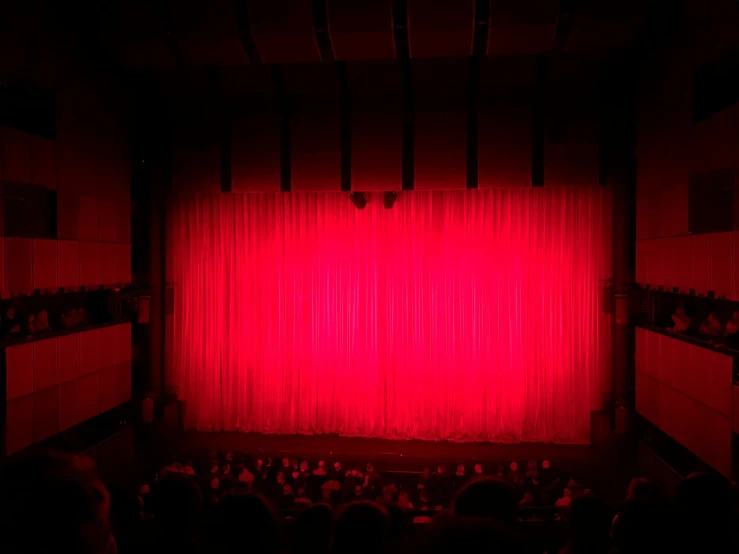 the curtains are red with light from within