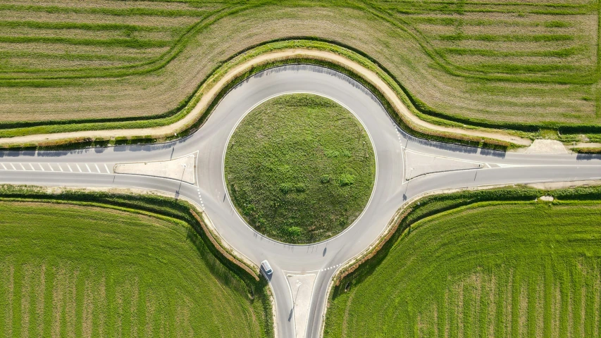 aerial view of an intersection on a rural road