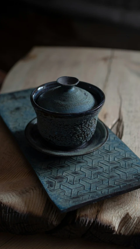 a teacup on top of a small tray