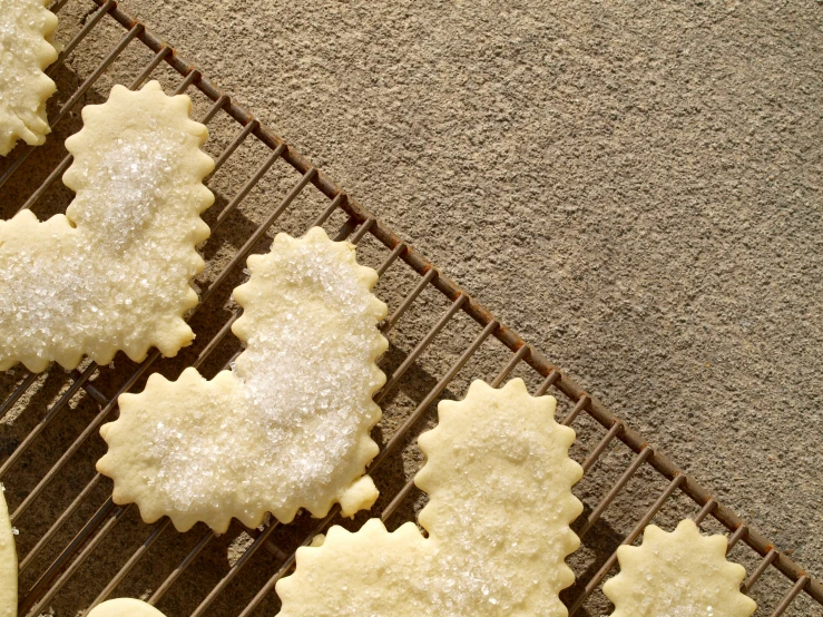 cookies cooling on a baking rack and cooling on a shelf