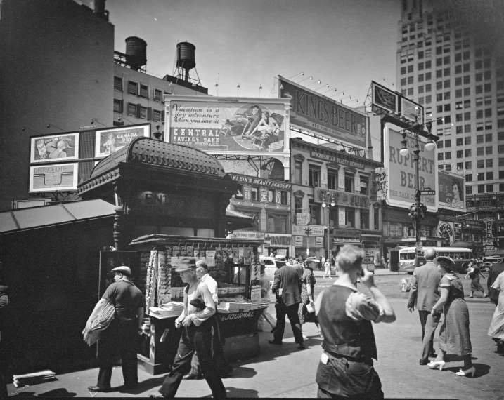 a group of people walking around in the city