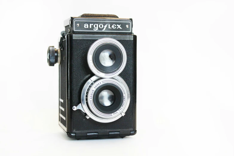 an old style camera with two speakers