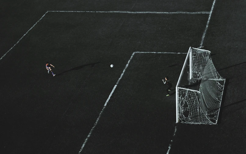 the soccer players are playing around the soccer field