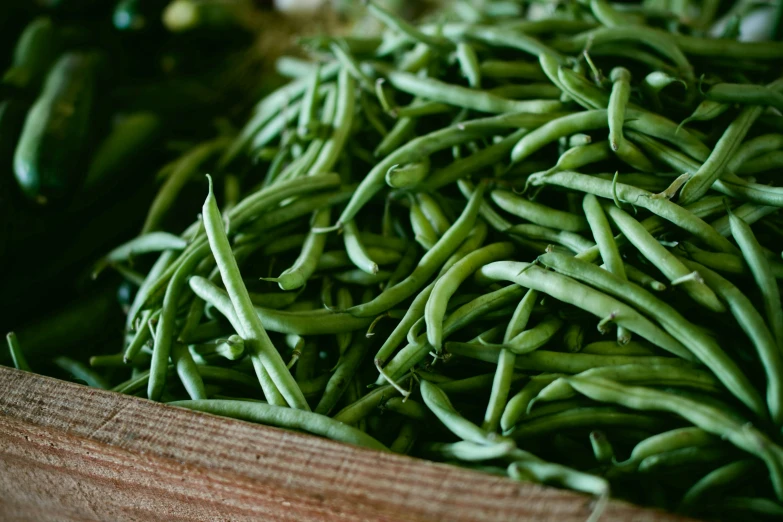 green beans are piled on top of each other