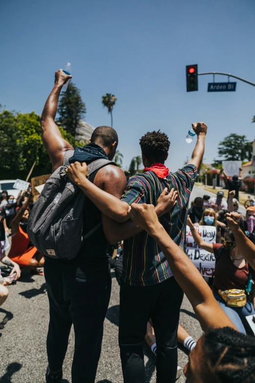 people in the street protesting with signs