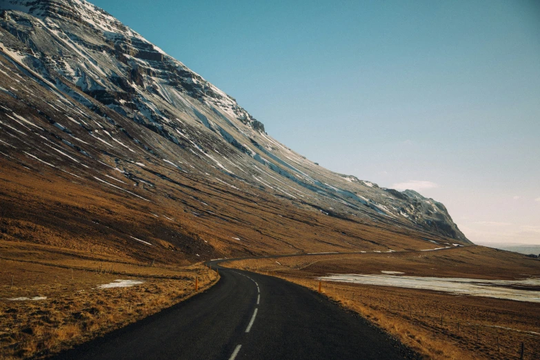 the road to nowhere leads to some majestic mountains