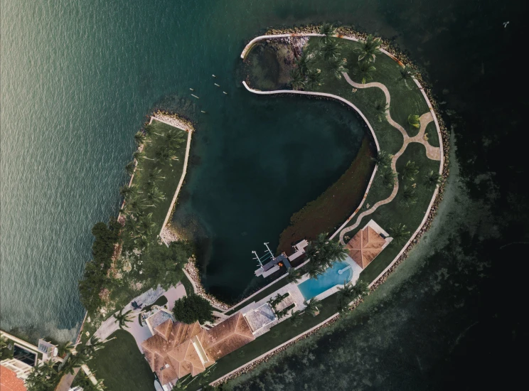 aerial s of waterfront area with buildings and trees in the foreground