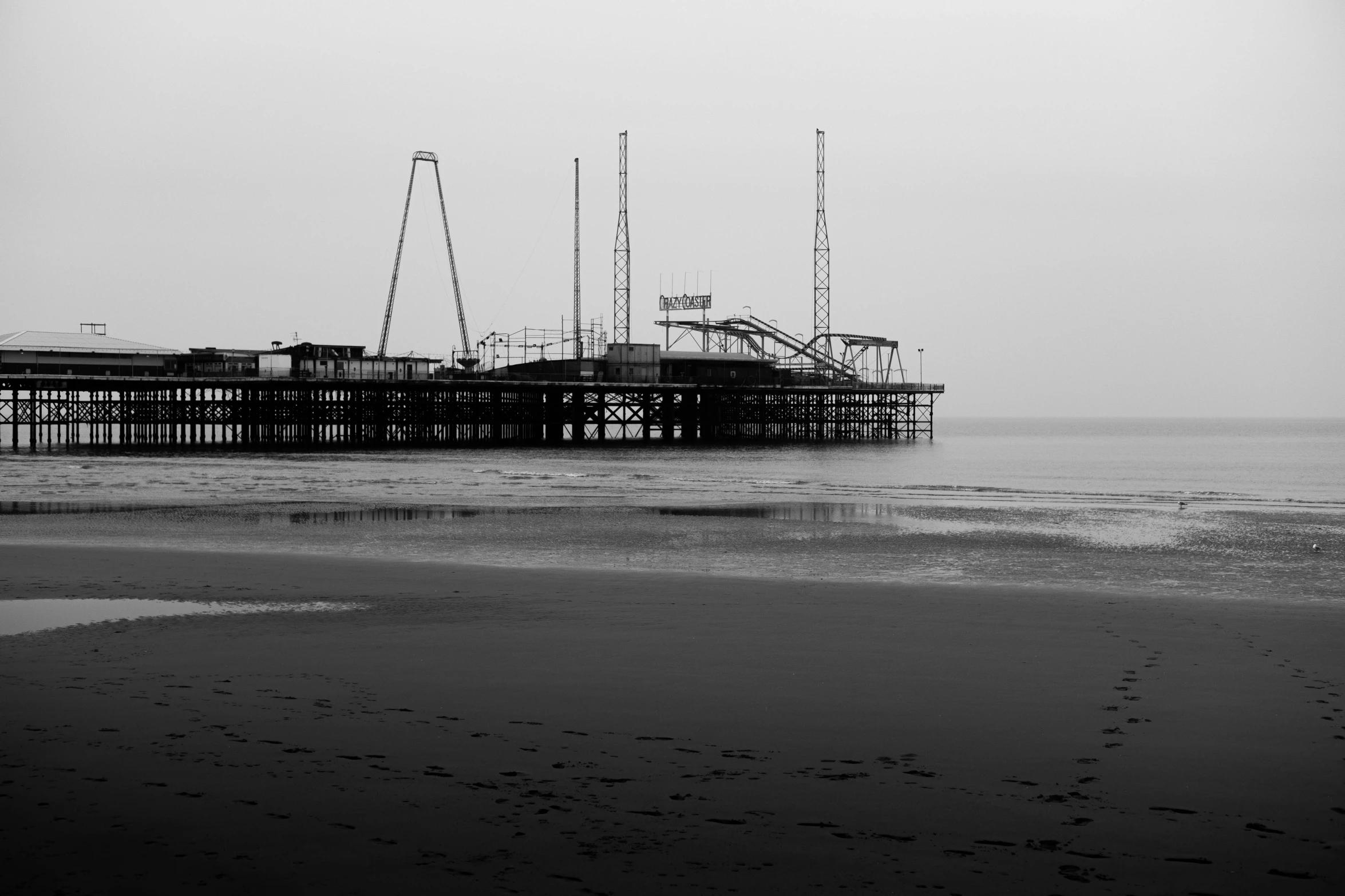 a black and white po of a pier