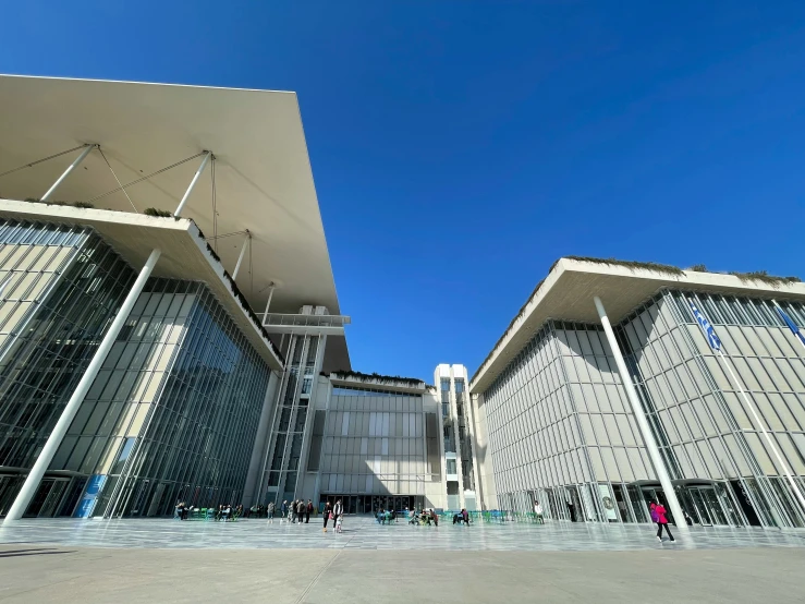 a large building that has been set against the blue sky