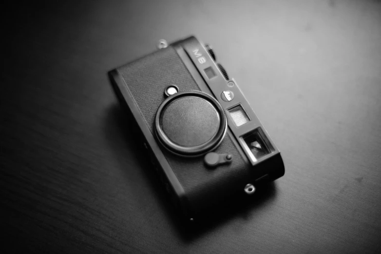a camera with a black ring on top of it