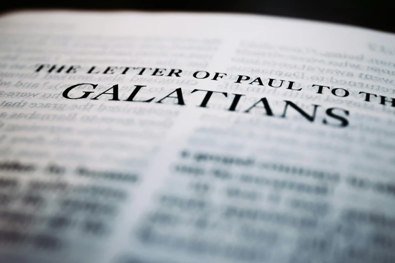 the letter of paul to the galatians is highlighted in a closeup image