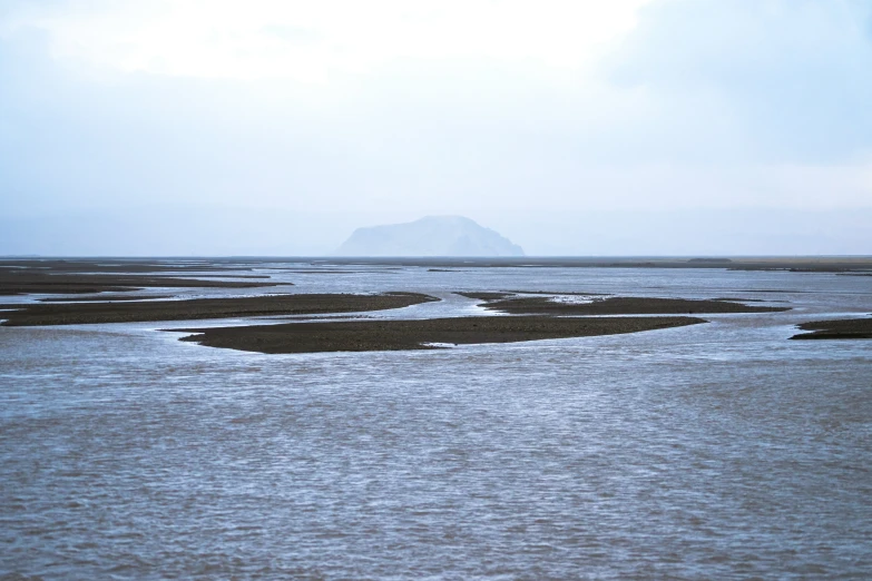 a body of water that has an island in the middle