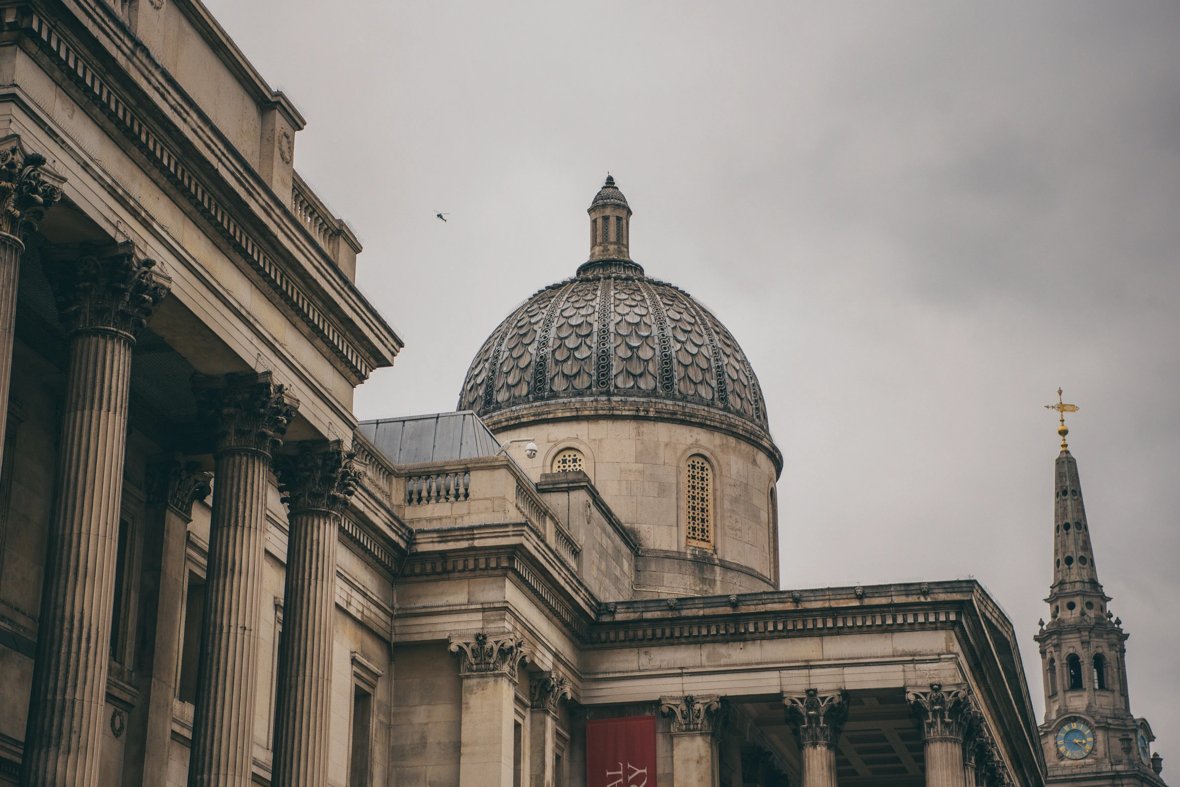 a large building with a dome on top