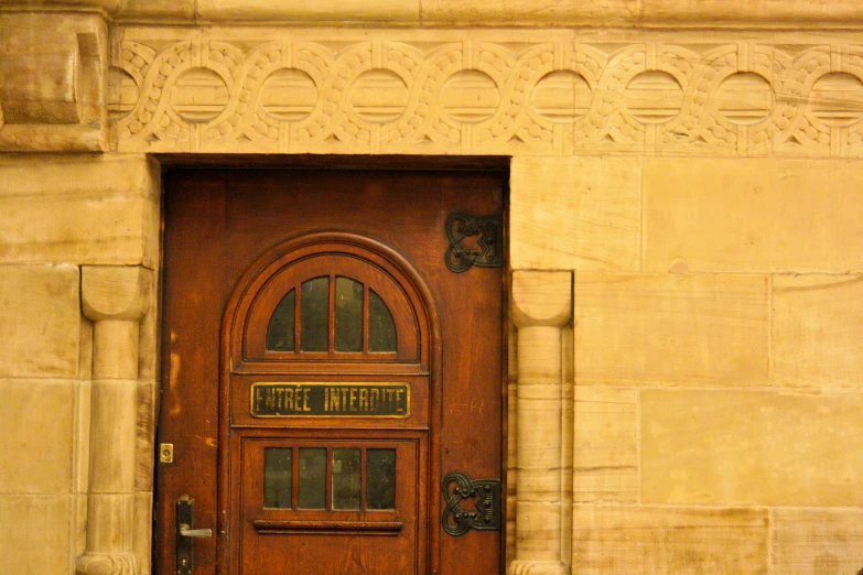 there is a big wooden door on this building