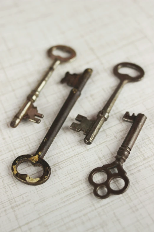 four old key pieces with some missing ones