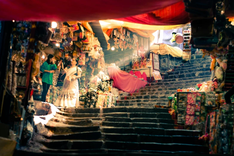 a street area with some steps and shops on it