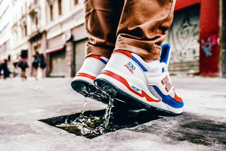 a person jumping up and down a step in the street