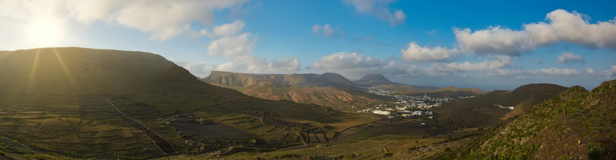 a view of mountains and the sea from an aerial po