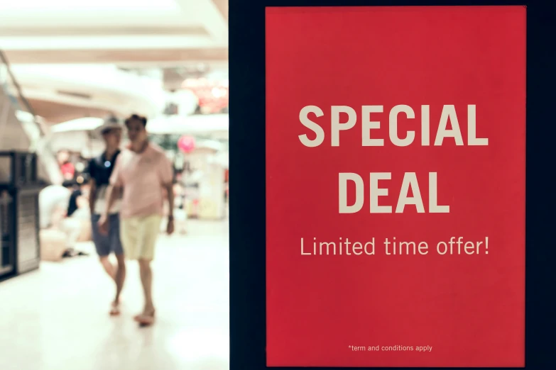 a sign for the special deal is posted in an airport