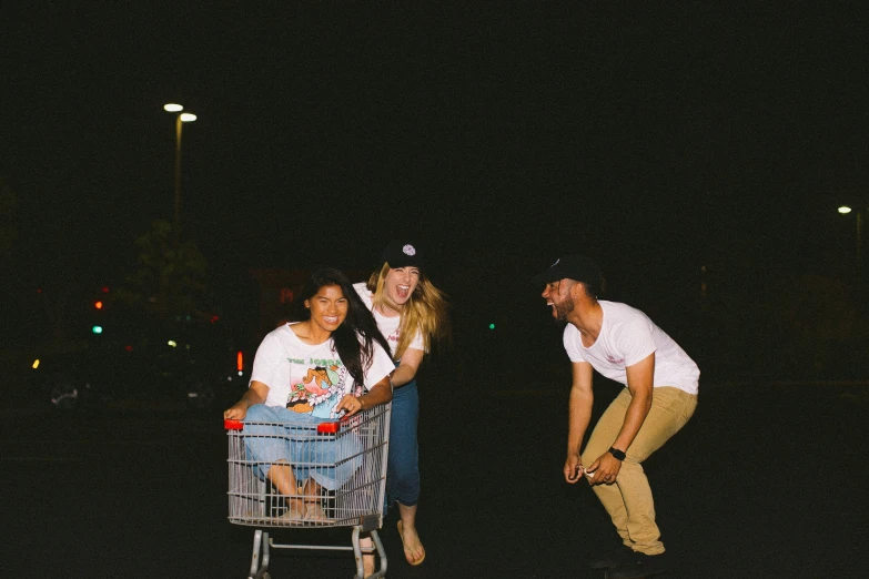 a man is hing a woman in a cart