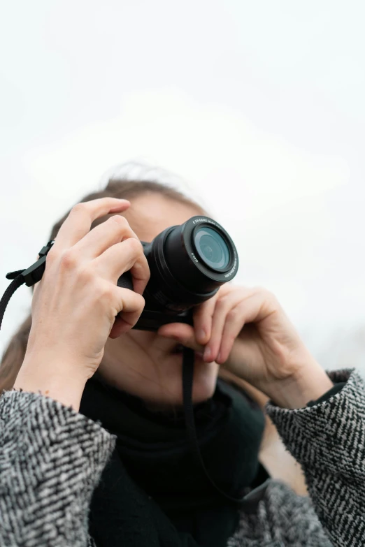 a person is taking pictures with their camera