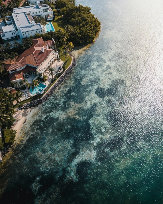 a bird's - eye view of a home along the water