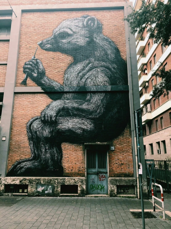 a building with large picture of a bear on the side of it