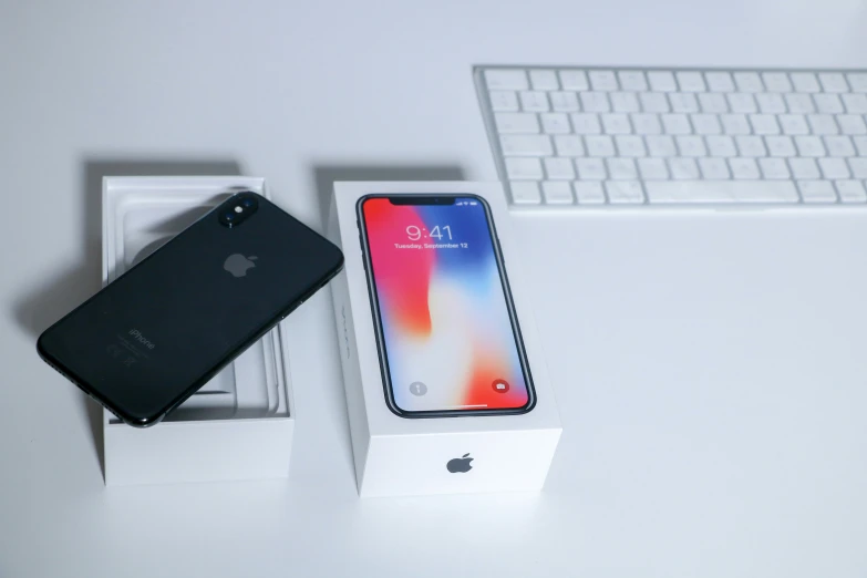 an apple iphone is sitting on top of the box