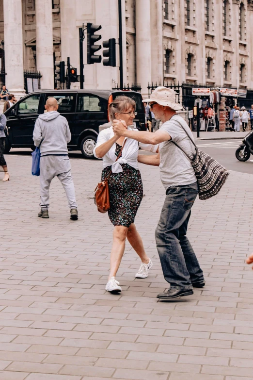 two people touching each other with their hands