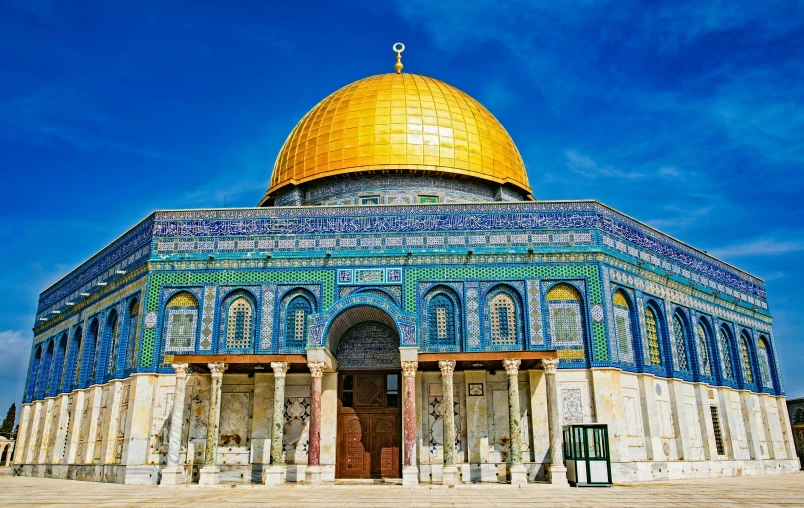 an ornately decorated dome sits on top of a building