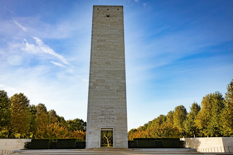 a monument in the middle of a forest