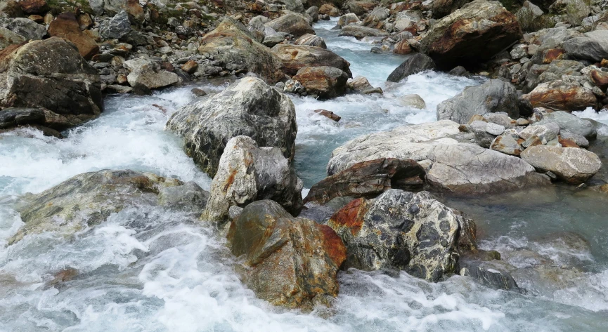 a river with very strong rocks and clear water