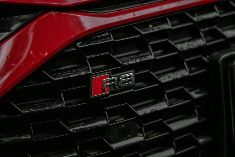 the grille of the sports utility vehicle with the emblem of the company