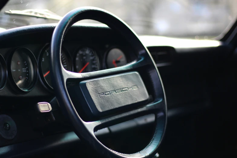 view of a car dashboard showing dash light and meter