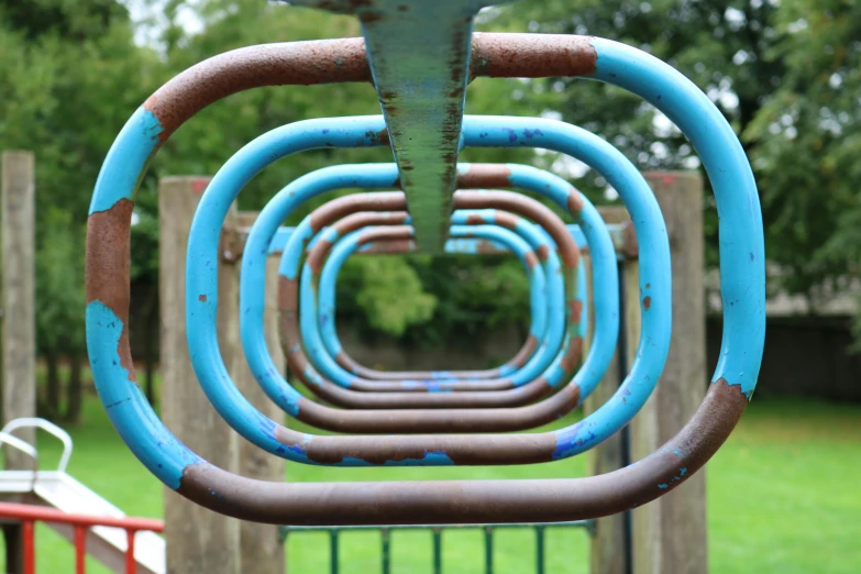 a bunch of pipes sitting next to each other on a park