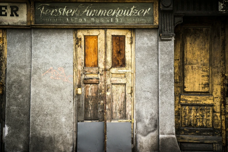 an old building with some signs on it