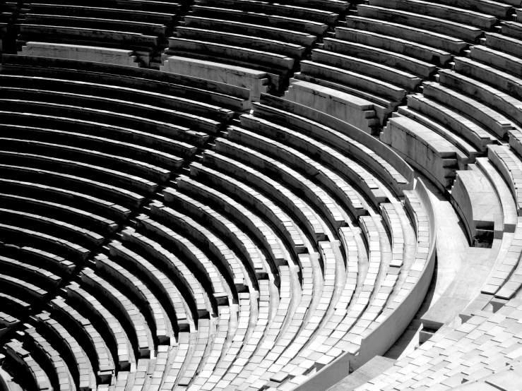 a row of empty chairs on a stadium