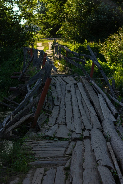 a wooden planked road with a long walkway