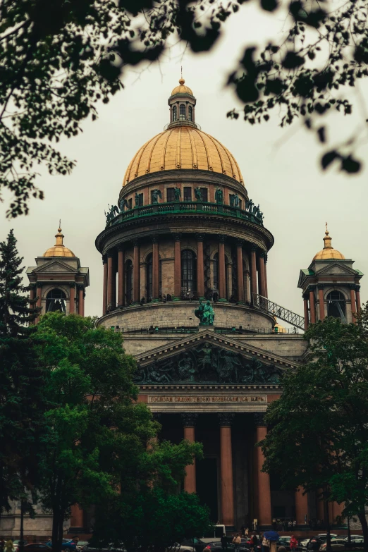 an ornate golden dome on top of a building