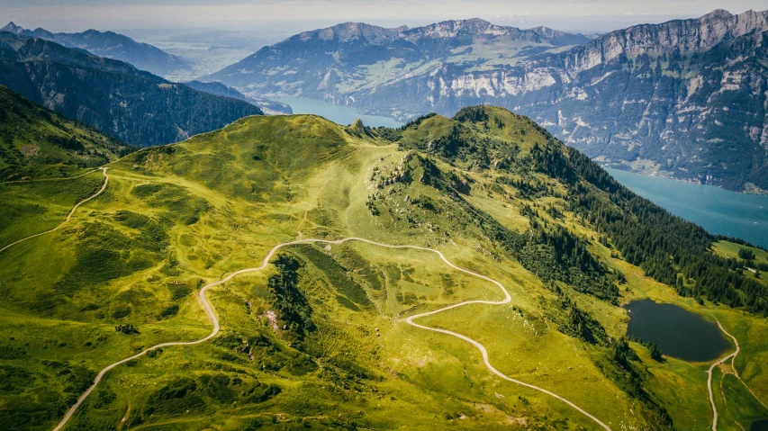 the view from an airplane looking over the mountains