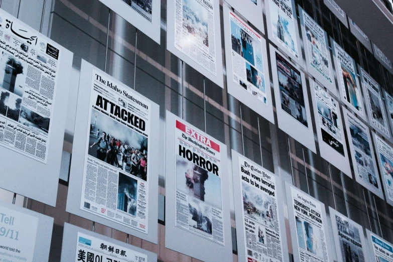 an assortment of paper and newspapers on display