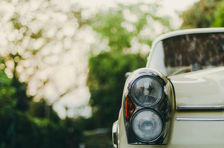 there is a closeup po of the front of an old car