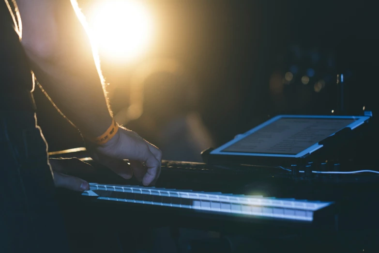 a person that is touching a keyboard