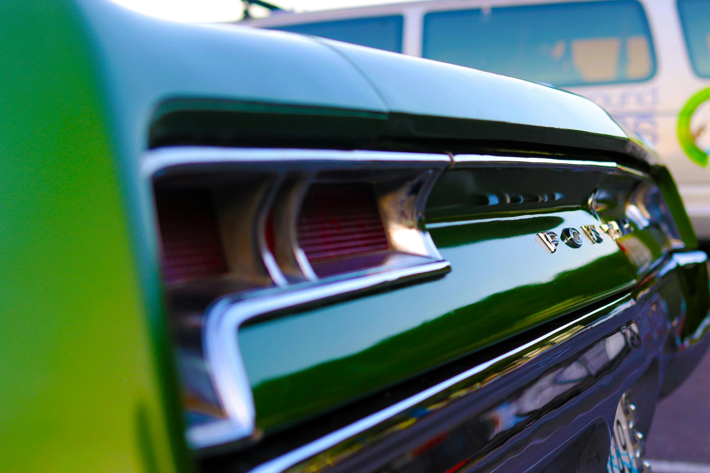 close up of the rear of a green car