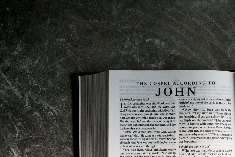 a book sitting on top of a marble counter