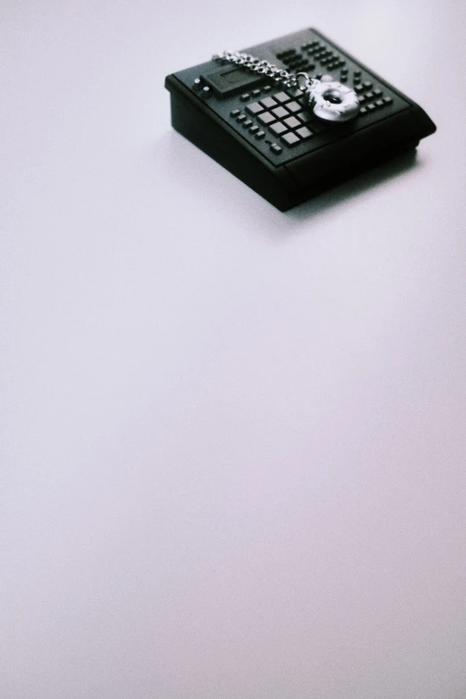 a phone sits on the floor on the table